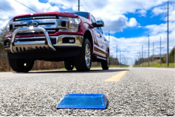 ORNL researchers have enabled standard raised pavement markers to transmit GPS information that helps autonomous driving features function better in remote areas or in bad weather. Credit: Carlos Jones/ORNL, U.S. Dept. of Energy